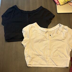 TWO aerie button top crops